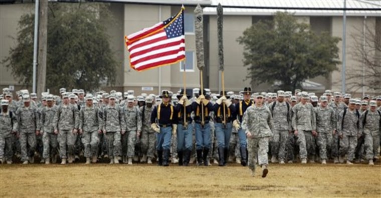 U.S. Army 1st Cavalry 3rd Brigade soldiers march onto the parade grounds upon their return home from deployment in Iraq, Saturday, Dec. 24, 2011, at Fort Hood, Texas. These 3rd Brigade troops were in the last convoy to leave Iraq. (AP Photo/Erich Schlegel)